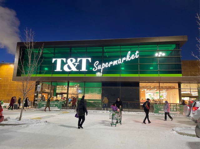 Shoppers walking in to T&T Supermarket in Calgary 